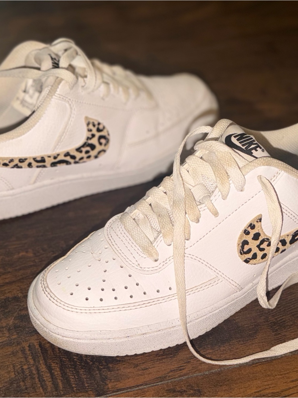 Nike White Low-Top Sneakers with Leopard Swoosh